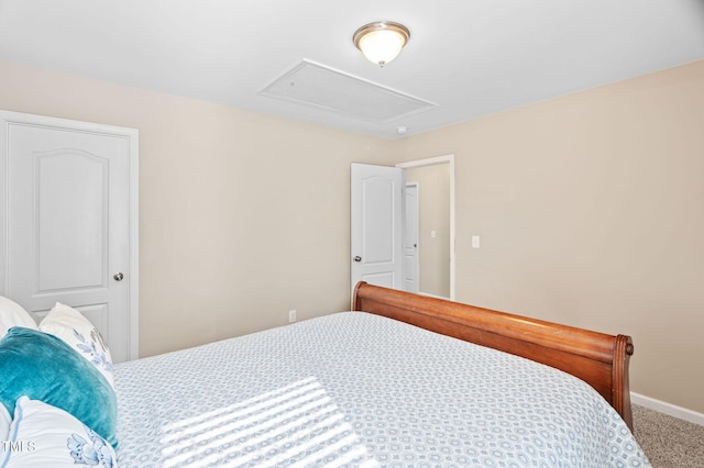 105 Putters Ct, Durham, NC 27703 - carpeted bedroom with attic access and baseboards