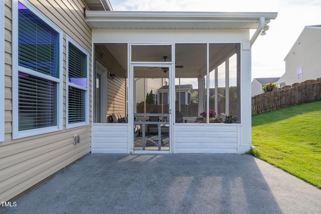 105 Putters Ct, Durham, NC 27703 - view of patio with a sunroom