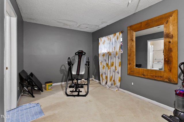 5931 Farm Gate Rd, Raleigh, NC 27606 - workout area featuring baseboards, carpet, and a textured ceiling
