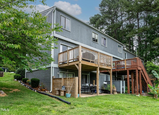 5931 Farm Gate Rd, Raleigh, NC 27606 - rear view of property with a deck, a lawn, stairs, and a patio