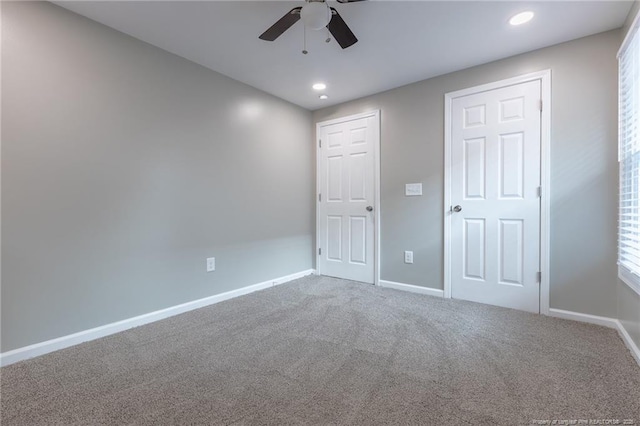 1117 Turnpike Rd, Fayetteville, NC 28305 - unfurnished bedroom featuring carpet flooring, baseboards, recessed lighting, and a ceiling fan
