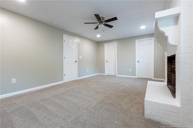 1117 Turnpike Rd, Fayetteville, NC 28305 - unfurnished living room with a ceiling fan, carpet floors, a fireplace, baseboards, and recessed lighting