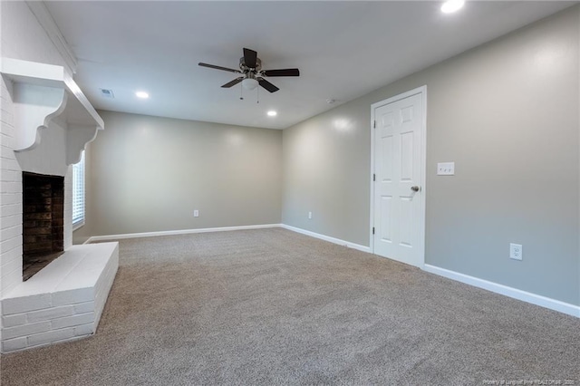1117 Turnpike Rd, Fayetteville, NC 28305 - unfurnished living room featuring a ceiling fan, recessed lighting, carpet floors, baseboards, and a fireplace