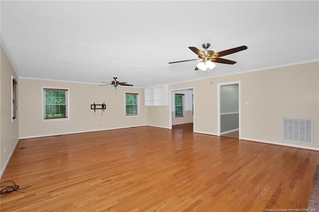 687 Blawell St, Stedman, NC 28391 - unfurnished living room featuring a ceiling fan, light wood finished floors, ornamental molding, and baseboards