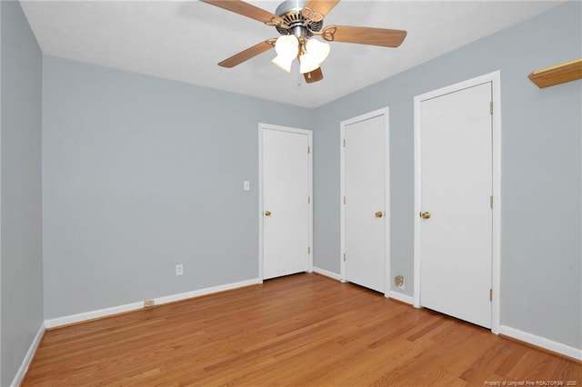 687 Blawell St, Stedman, NC 28391 - unfurnished bedroom with wood finished floors, baseboards, and ceiling fan