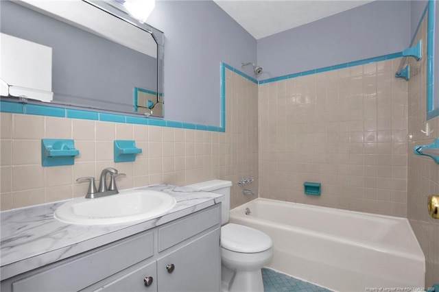 687 Blawell St, Stedman, NC 28391 - full bathroom with shower / tub combination, toilet, vanity, tile walls, and tile patterned flooring