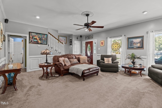 200 Mint Ct, Goldsboro, NC 27530 - living area with carpet, a decorative wall, stairs, ornamental molding, and a ceiling fan