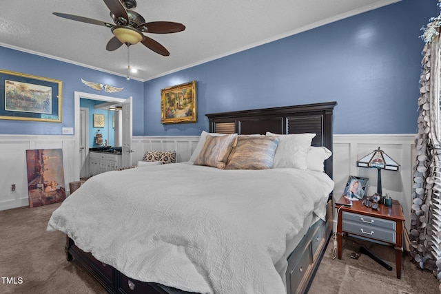 200 Mint Ct, Goldsboro, NC 27530 - carpeted bedroom with ornamental molding, a wainscoted wall, a decorative wall, ceiling fan, and a textured ceiling