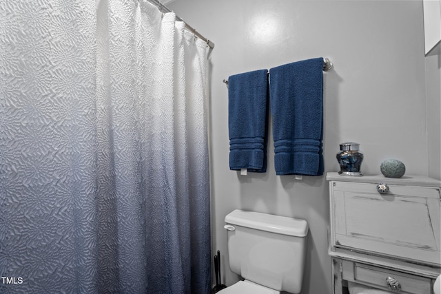 200 Mint Ct, Goldsboro, NC 27530 - bathroom with toilet and curtained shower
