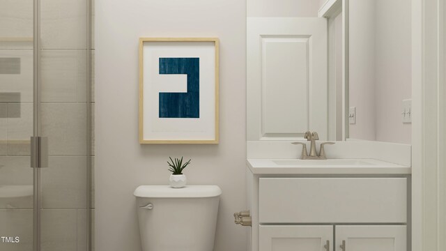 880 Cassa Clubhouse Way, Knightdale, NC 27545 - bathroom featuring toilet, vanity, and tiled shower