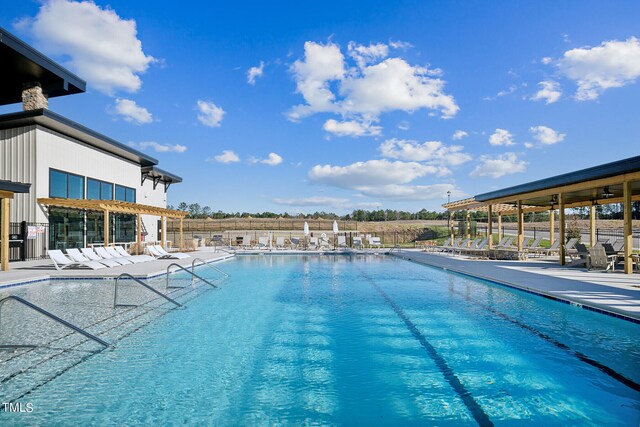 880 Cassa Clubhouse Way, Knightdale, NC 27545 - community pool featuring a patio area