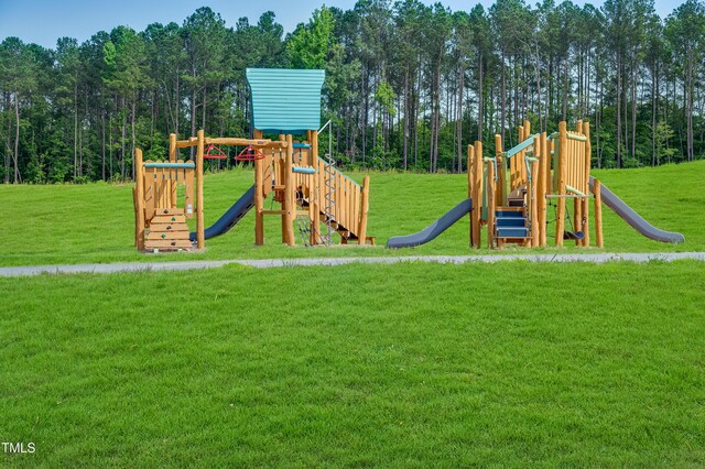 880 Cassa Clubhouse Way, Knightdale, NC 27545 - communal playground featuring a lawn