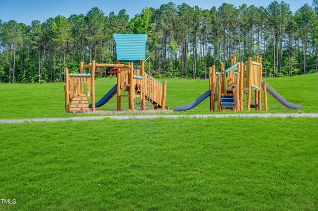 880 Cassa Clubhouse Way, Knightdale, NC 27545 - communal playground featuring a yard