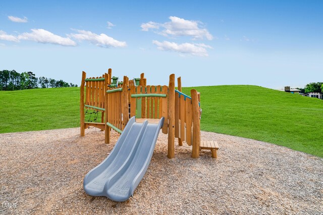 880 Cassa Clubhouse Way, Knightdale, NC 27545 - community play area with a lawn