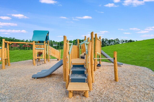 880 Cassa Clubhouse Way, Knightdale, NC 27545 - communal playground featuring a lawn