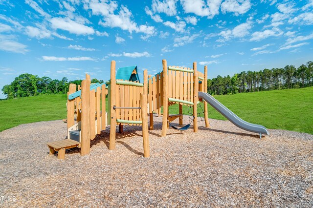 880 Cassa Clubhouse Way, Knightdale, NC 27545 - community playground featuring a lawn