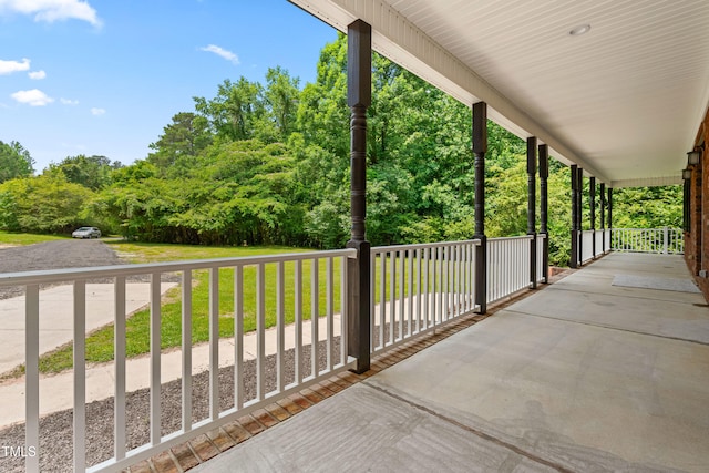 2015 Saddlebrook Dr, Archer Lodge, NC 27527 - covered porch with a yard