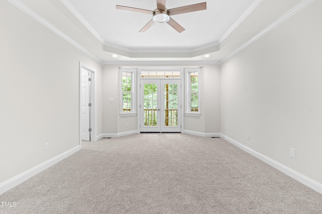 2015 Saddlebrook Dr, Archer Lodge, NC 27527 - carpeted empty room with a tray ceiling, ceiling fan, crown molding, baseboards, and recessed lighting