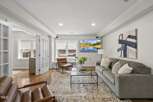 704 Walcott Way, Cary, NC 27519 - living room featuring recessed lighting and baseboards