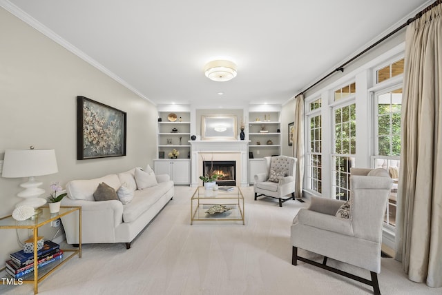 704 Walcott Way, Cary, NC 27519 - living room featuring ornamental molding, a glass covered fireplace, carpet, and built in features