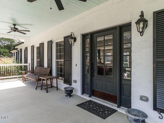 1625 Haystack Ln, Burlington, NC 27217 - doorway to property featuring a porch and ceiling fan