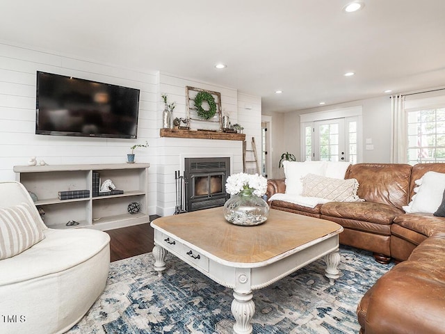 1625 Haystack Ln, Burlington, NC 27217 - living area featuring wood finished floors, recessed lighting, and a glass covered fireplace