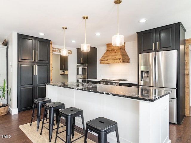 1625 Haystack Ln, Burlington, NC 27217 - kitchen featuring stainless steel appliances, custom exhaust hood, dark stone countertops, dark wood-style flooring, and recessed lighting