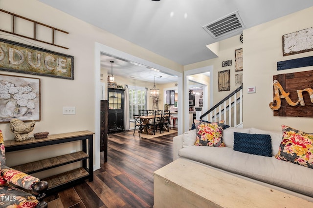 4409 All Points View Way, Raleigh, NC 27614 - living area with dark wood finished floors, stairs, and a chandelier