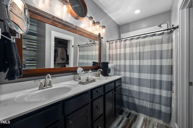 4409 All Points View Way, Raleigh, NC 27614 - bathroom with double vanity, a shower with shower curtain, and recessed lighting