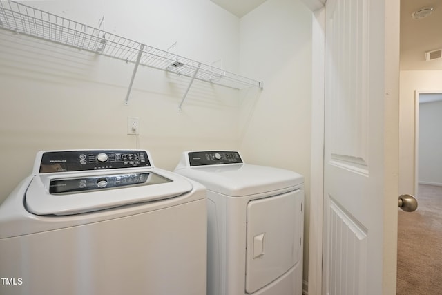 72 S Grey Abbey Dr, Clayton, NC 27527 - laundry area with washer and clothes dryer and carpet flooring