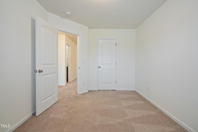 72 S Grey Abbey Dr, Clayton, NC 27527 - unfurnished bedroom featuring light colored carpet and baseboards