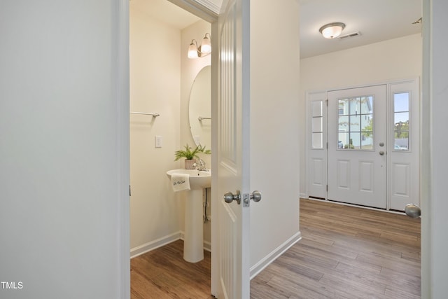 72 S Grey Abbey Dr, Clayton, NC 27527 - foyer with light wood-style floors and baseboards
