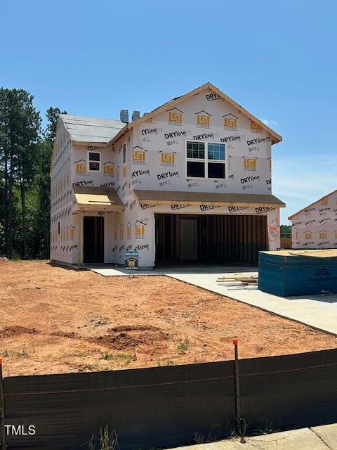 51 Crow Field St, Roxboro, NC 27574 - property under construction featuring a garage and driveway