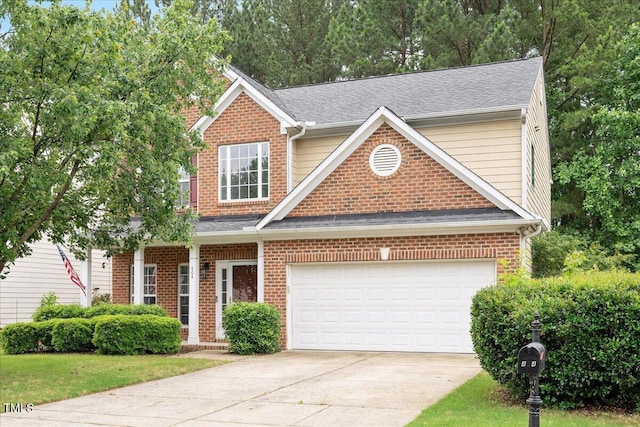 404 Straywhite Ave, Apex, NC 27539 - view of front of property with driveway, a garage, and brick siding