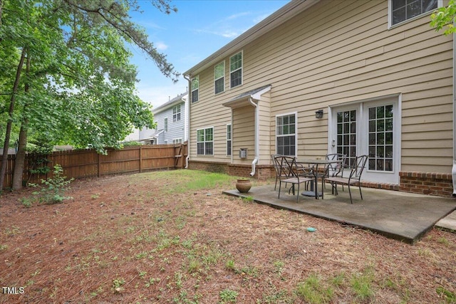 404 Straywhite Ave, Apex, NC 27539 - rear view of property featuring a fenced backyard and a patio area