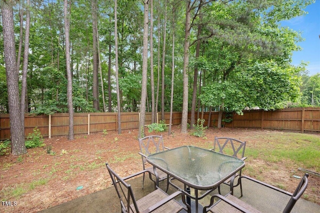 404 Straywhite Ave, Apex, NC 27539 - fenced backyard featuring outdoor dining area