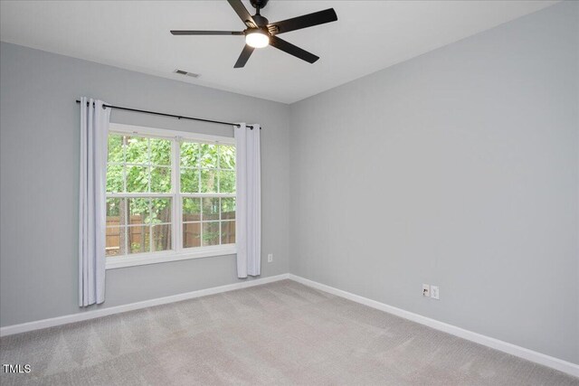 404 Straywhite Ave, Apex, NC 27539 - spare room featuring ceiling fan, baseboards, and carpet floors
