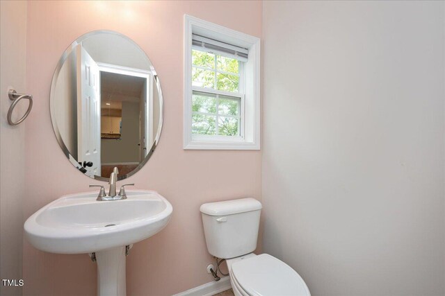 404 Straywhite Ave, Apex, NC 27539 - half bathroom with toilet and baseboards