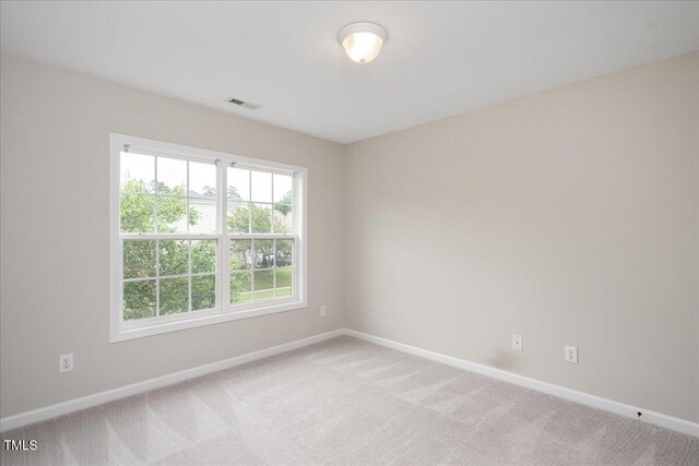 404 Straywhite Ave, Apex, NC 27539 - spare room featuring baseboards and light carpet