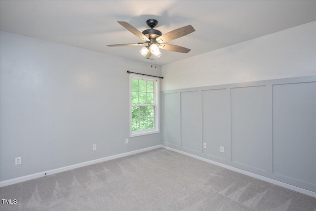 404 Straywhite Ave, Apex, NC 27539 - spare room featuring a decorative wall, ceiling fan, and carpet floors
