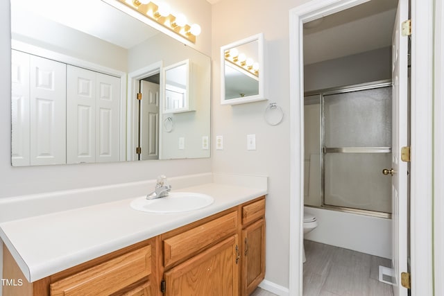 96 Landmark Dr, Angier, NC 27501 - full bath with vanity, toilet, and shower / bath combination with glass door