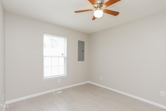 96 Landmark Dr, Angier, NC 27501 - spare room featuring electric panel, baseboards, and a ceiling fan