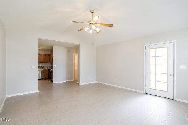96 Landmark Dr, Angier, NC 27501 - unfurnished living room featuring a ceiling fan, baseboards, and vaulted ceiling