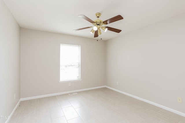 96 Landmark Dr, Angier, NC 27501 - empty room with a ceiling fan and baseboards