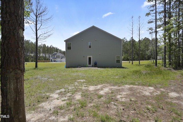 124 Teagarden Ct, Sanford, NC 27332 - back of property featuring a lawn