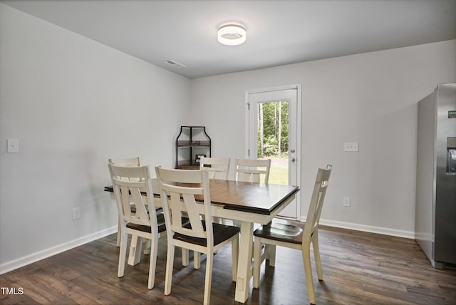 124 Teagarden Ct, Sanford, NC 27332 - dining space featuring dark wood-type flooring and baseboards
