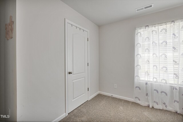 124 Teagarden Ct, Sanford, NC 27332 - unfurnished room with light colored carpet and baseboards