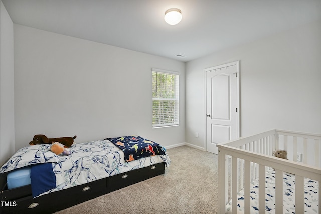124 Teagarden Ct, Sanford, NC 27332 - carpeted bedroom featuring baseboards