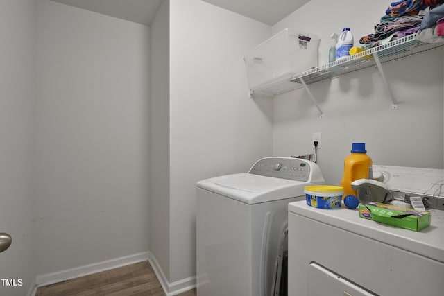 124 Teagarden Ct, Sanford, NC 27332 - laundry room with washer and dryer, wood finished floors, and baseboards