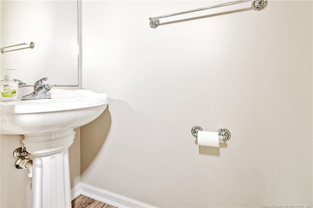 1414 Seabiscuit Dr, Parkton, NC 28371 - bathroom with baseboards and a sink